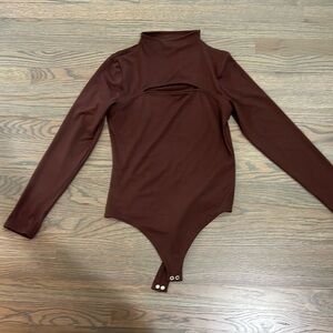 Brown body suit